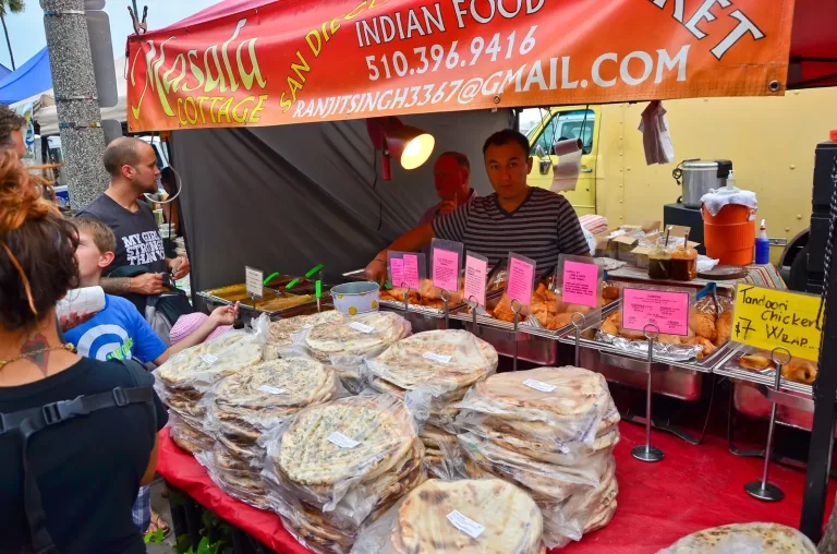 A food stall piled with flatbreads at the Ocean Beach Wednesday farmers market
