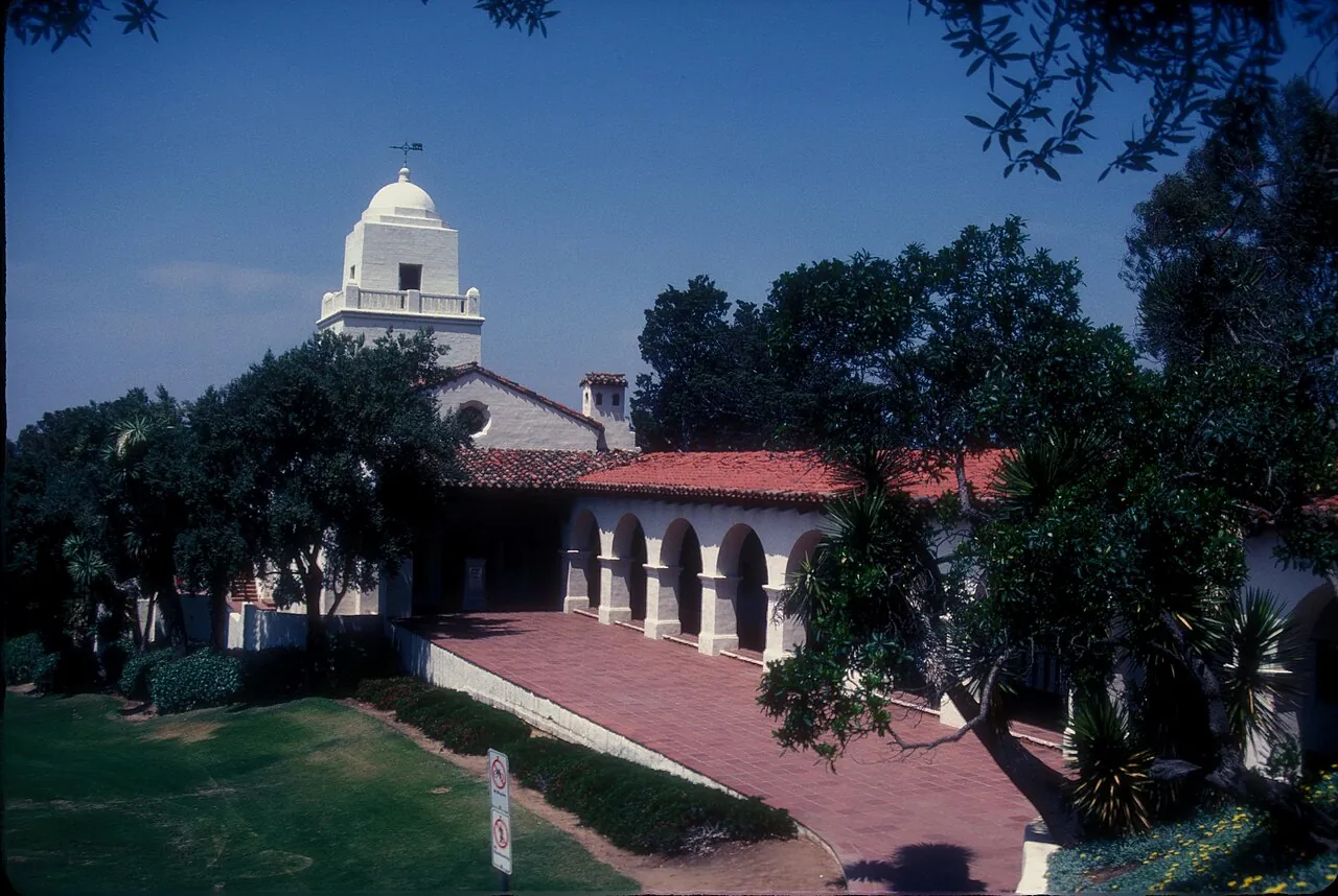 The white tower and red-tile arcade of the Junipero Serra Museum in Presidio Park, San Diego