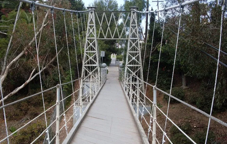 The Spruce Street Suspension Bridge stretching across a leafy canyon in Bankers Hill